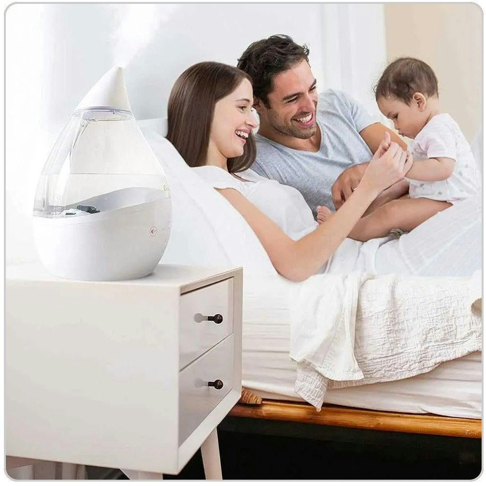 A family in the living room with an Air Purifier