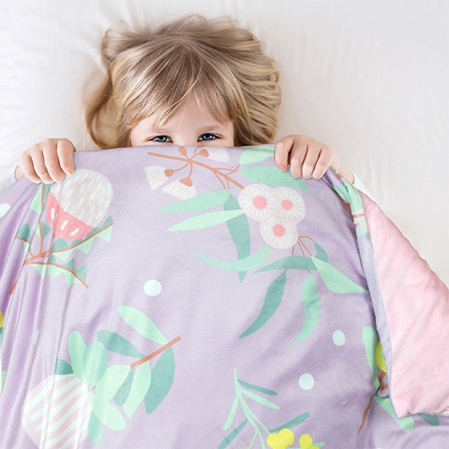 Kid sleeping on the alice spring weighted blanket