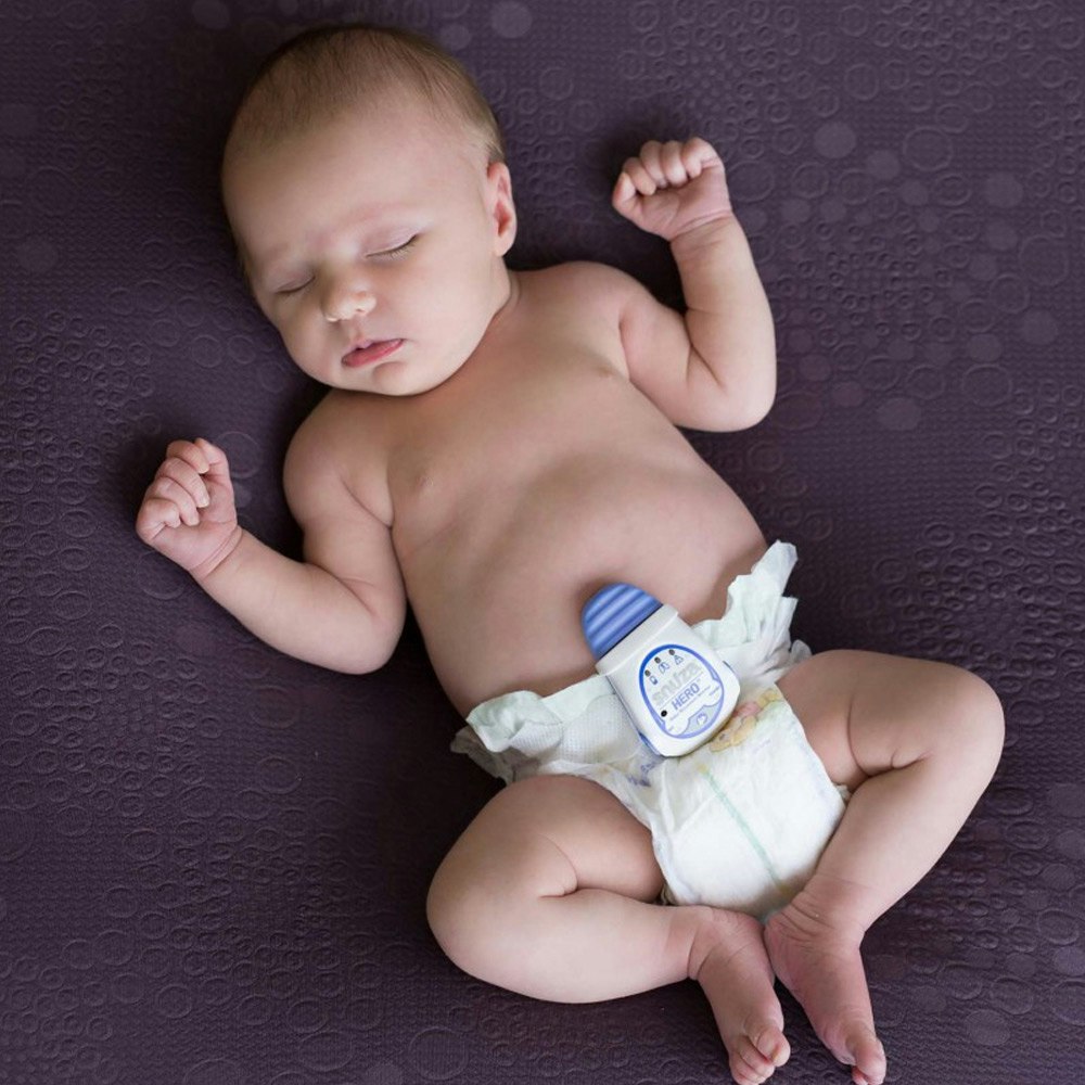Snuza Hero Mobile Baby Movement Monitor attached to the nappy of the baby