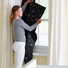Gro Anywhere Portable Window Blockout Blind Putting out the Blind